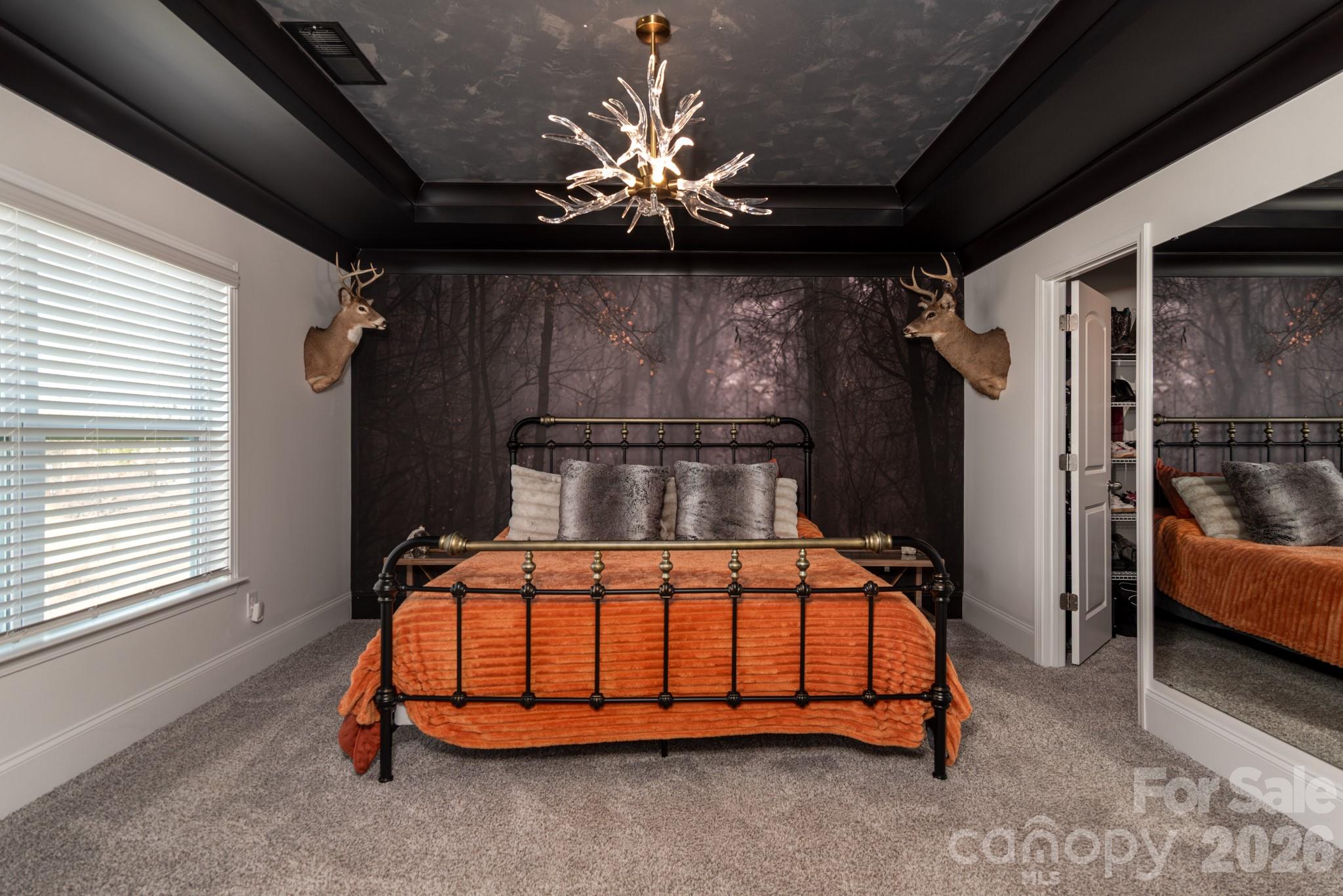 16629 Summers Walk Boulevard Davidson, NC 28036 - Photo 10 of 29 a bedroom with a bed a couch and a window