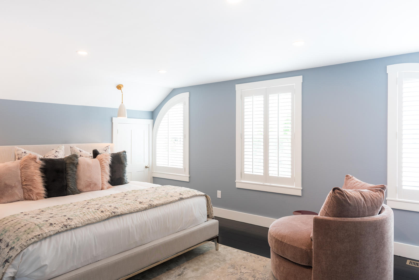 59 Orange Street Nantucket, MA 02554 - Photo 25 of 42 a bedroom with a bed and couch