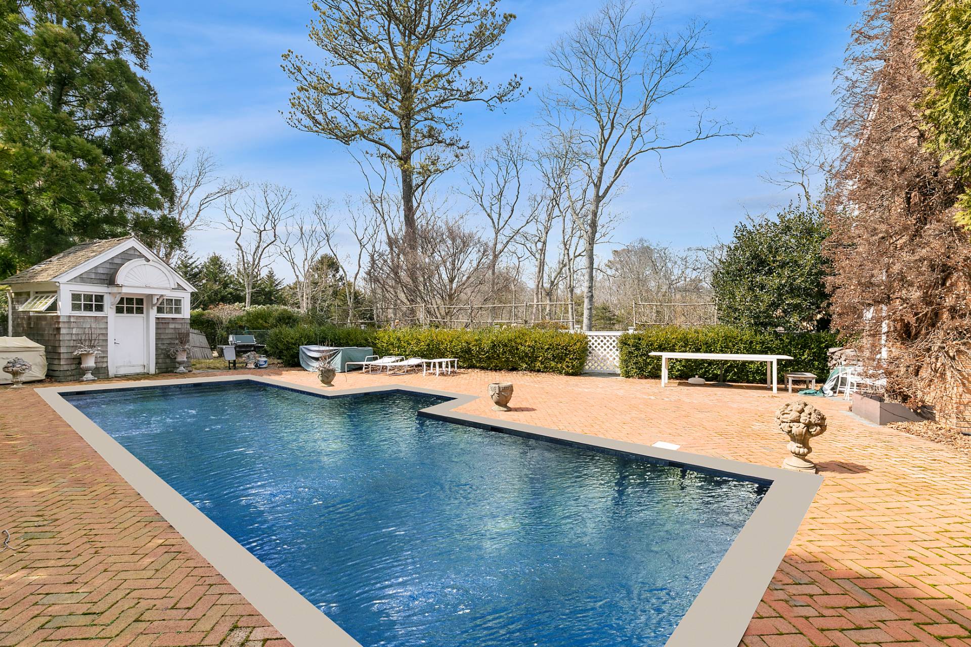 97 Briar Patch Road East Hampton, NY 11937 - Photo 11 of 12 a view of a swimming pool with lounge chair