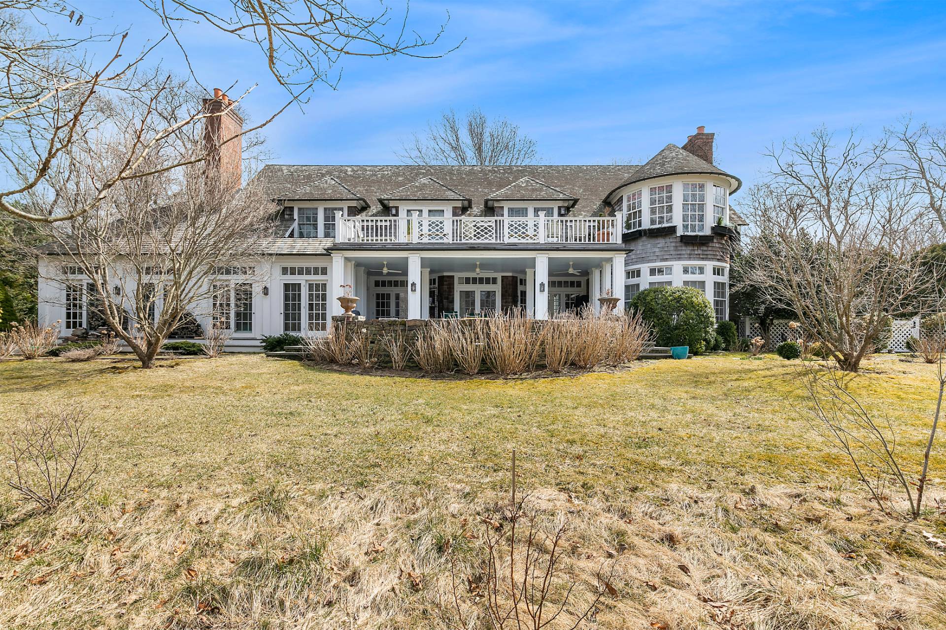 97 Briar Patch Road East Hampton, NY 11937 - Photo 10 of 12 a front view of a house with a yard