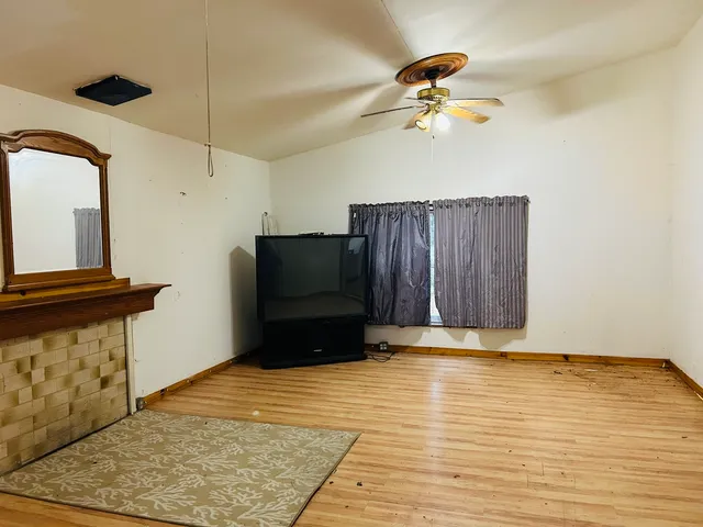 a view of a livingroom with a flat screen tv