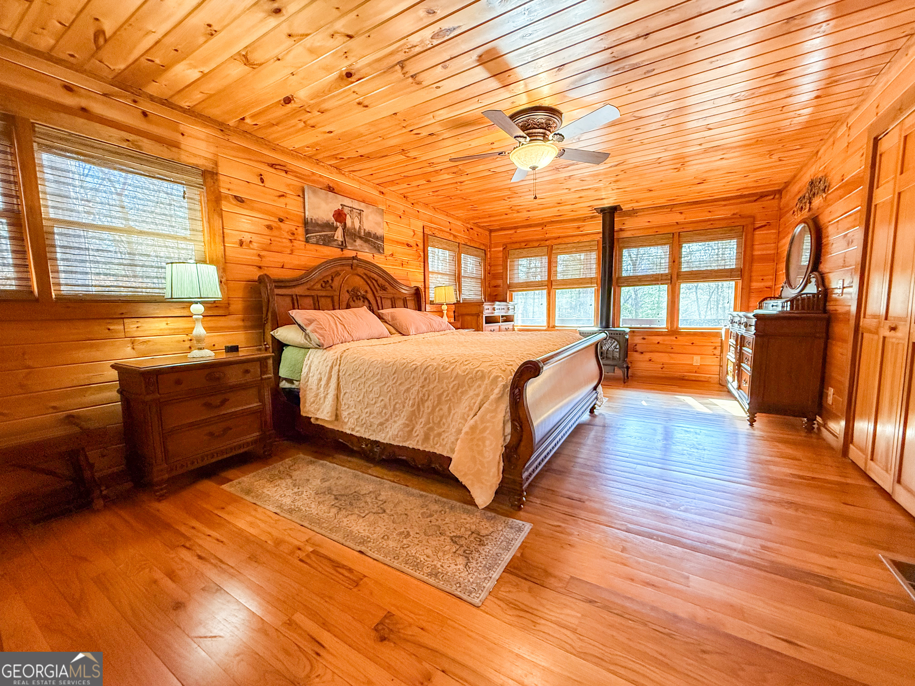 202 Shepherds Ridge Morganton, GA 30560 - Photo 18 of 74 a bedroom with a bed and wooden floor