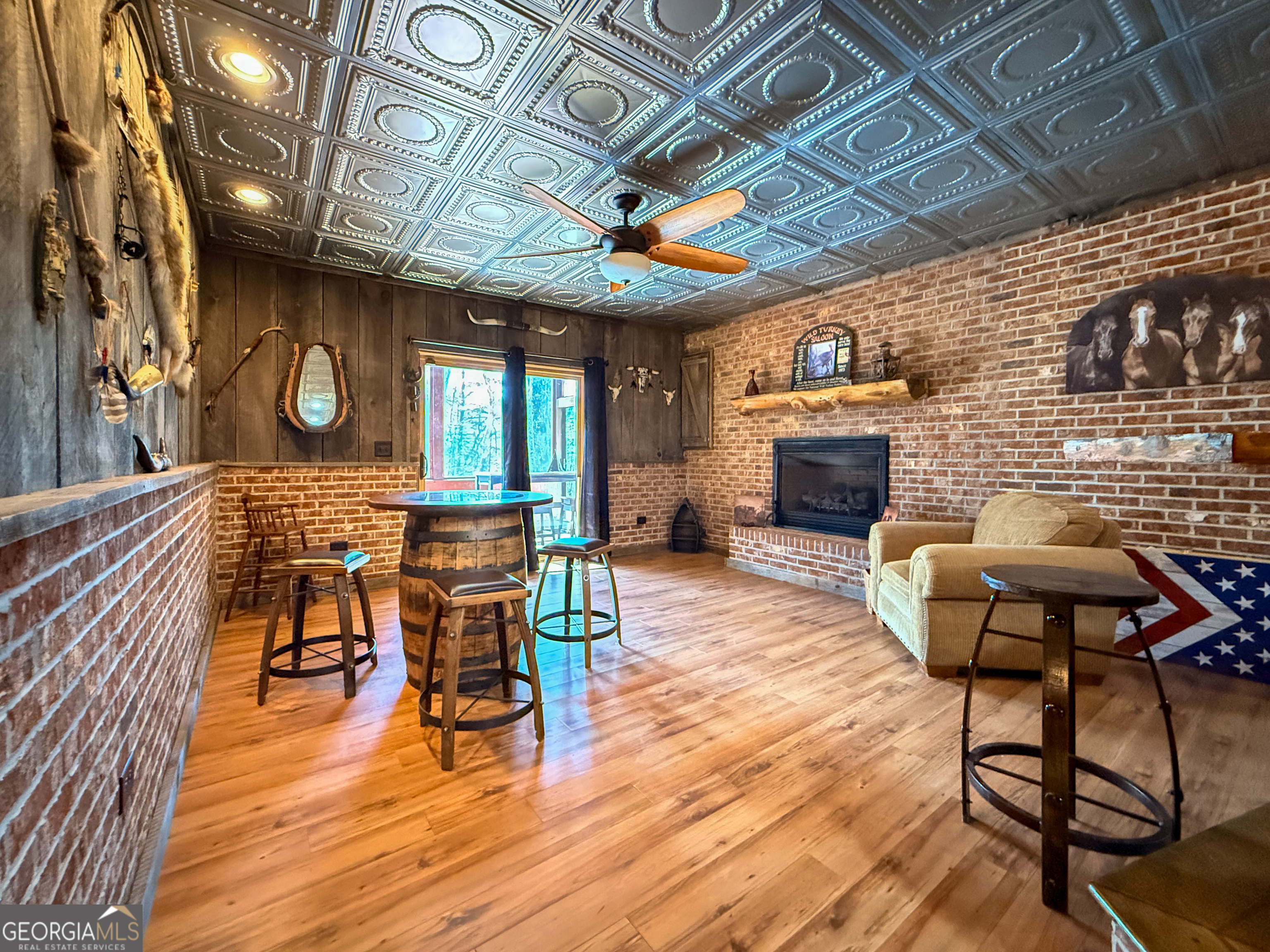 202 Shepherds Ridge Morganton, GA 30560 - Photo 43 of 74 a view of a dining room with furniture window and wooden floor