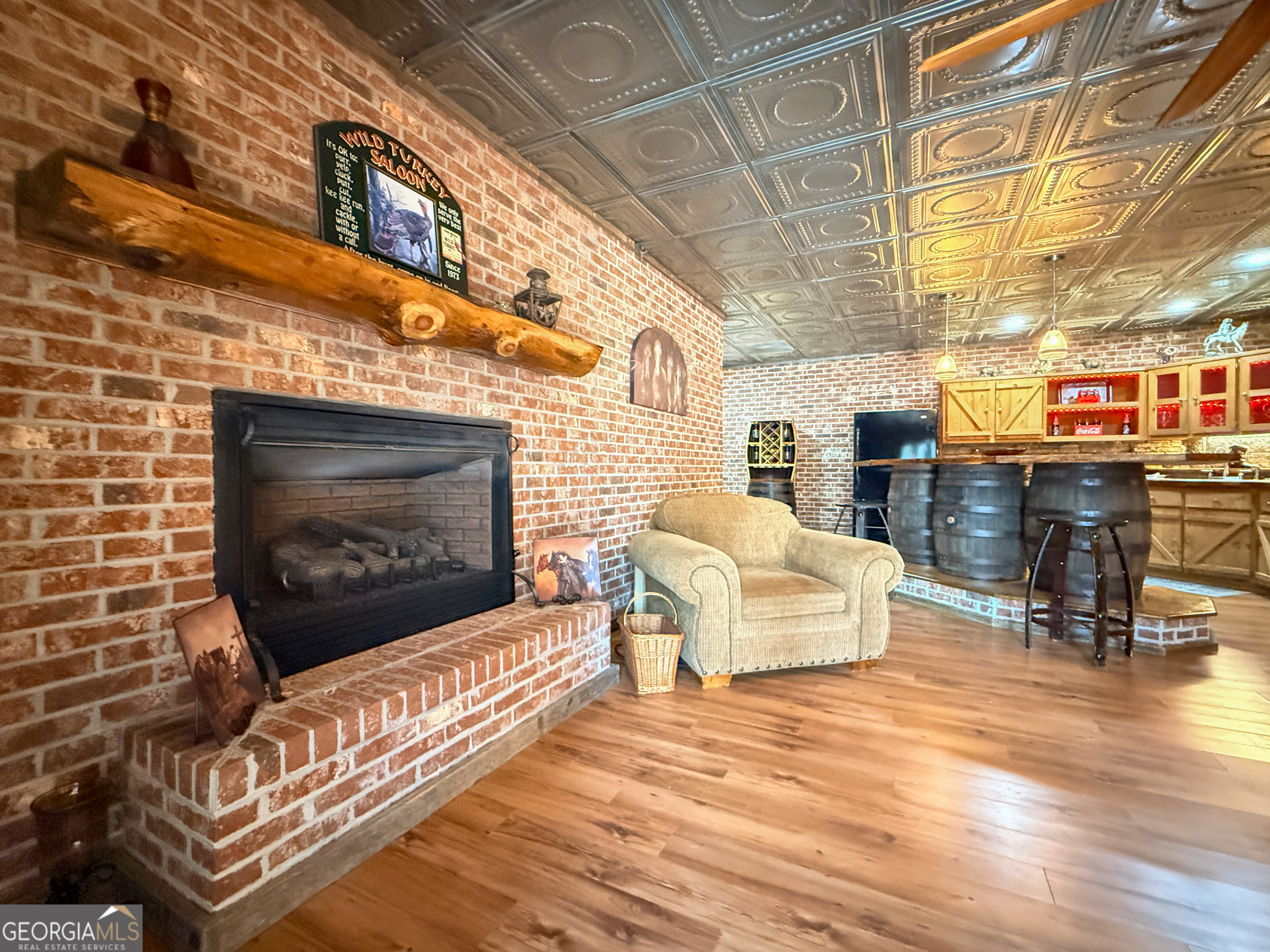 202 Shepherds Ridge Morganton, GA 30560 - Photo 46 of 74 a living room with furniture and a fireplace