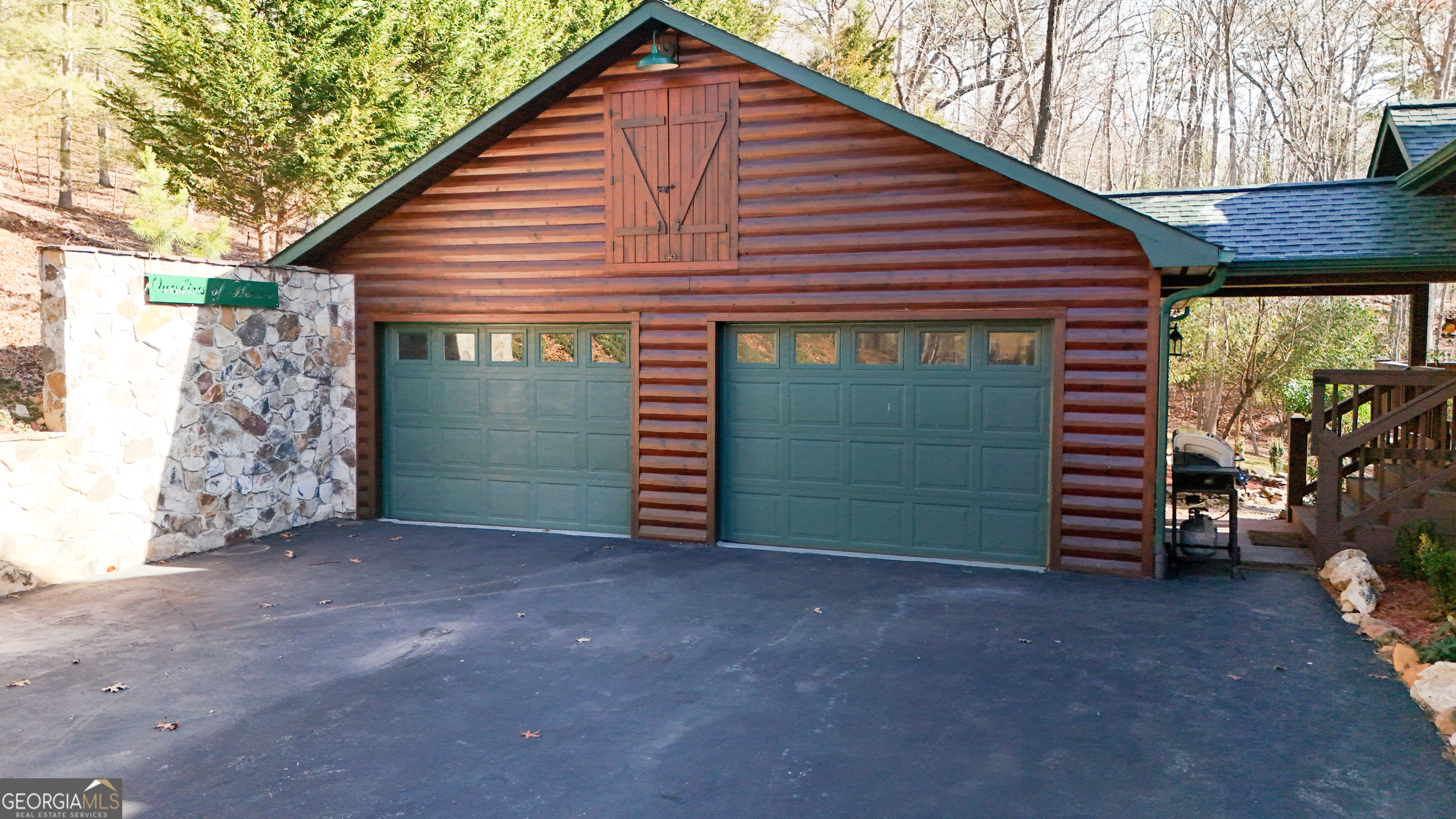 202 Shepherds Ridge Morganton, GA 30560 - Photo 58 of 74 a view of a house with a yard and garage