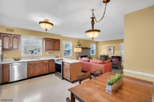 a living room with furniture and a table