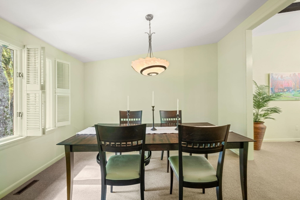 23 Indian Ridge Road Natick, MA 01760 - Photo 11 of 40 a dining room with furniture and window