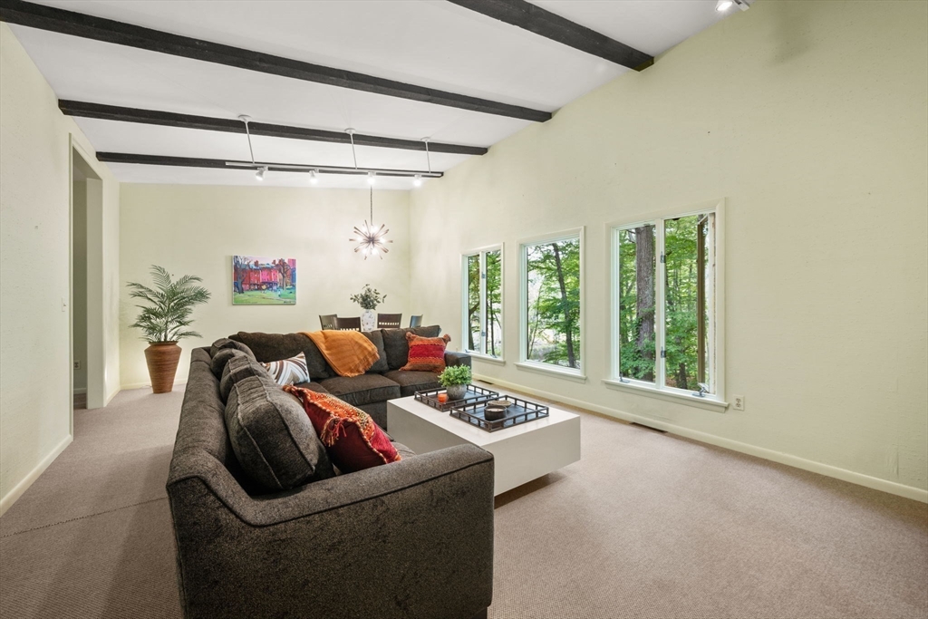 23 Indian Ridge Road Natick, MA 01760 - Photo 2 of 40 a living room with furniture and a window