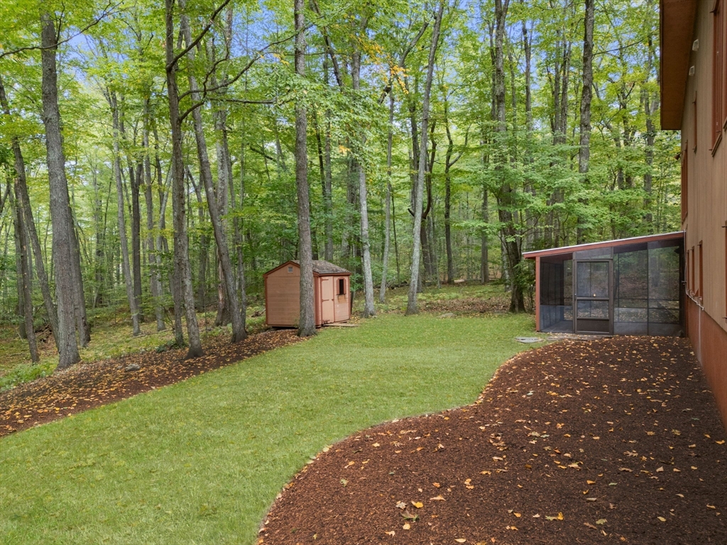 23 Indian Ridge Road Natick, MA 01760 - Photo 27 of 40 a view of a back yard
