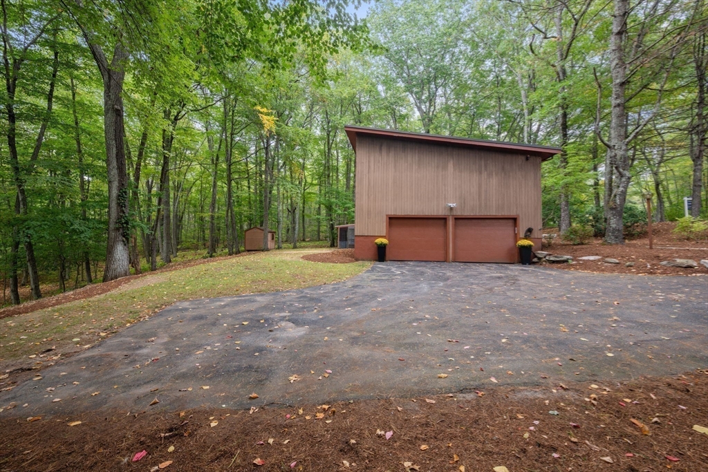 23 Indian Ridge Road Natick, MA 01760 - Photo 30 of 40 a view of backyard with outdoor space