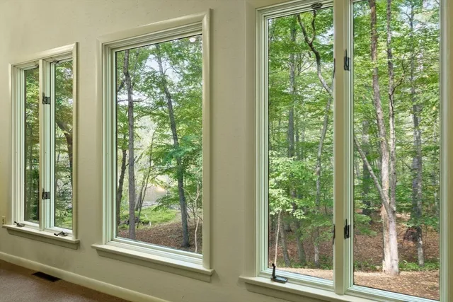 a view of a room that has a balcony