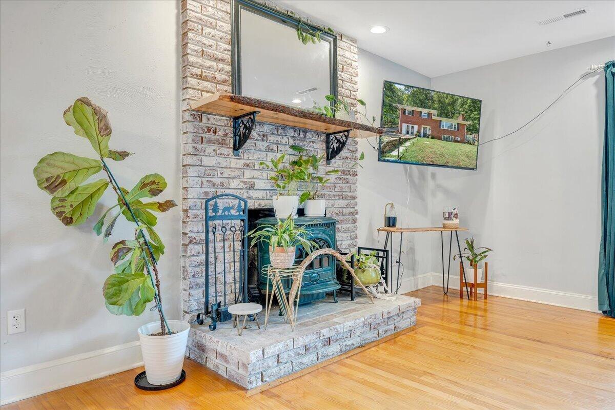731 Eddies Road Salem, VA 24153 - Photo 9 of 48 Charming decorative brick fireplace
