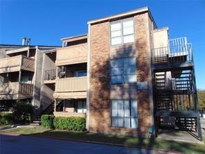 a front view of a building with glass windows