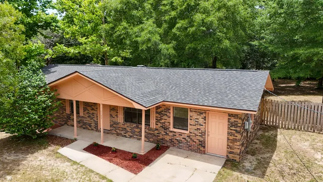a aerial view of a house with a balcony