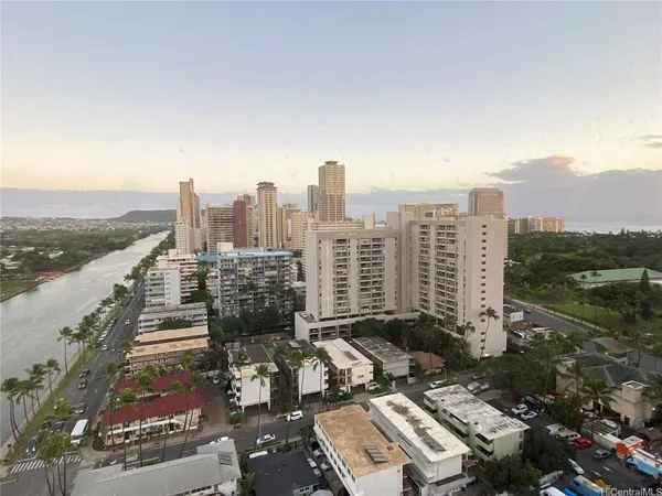 a view of a city with tall buildings