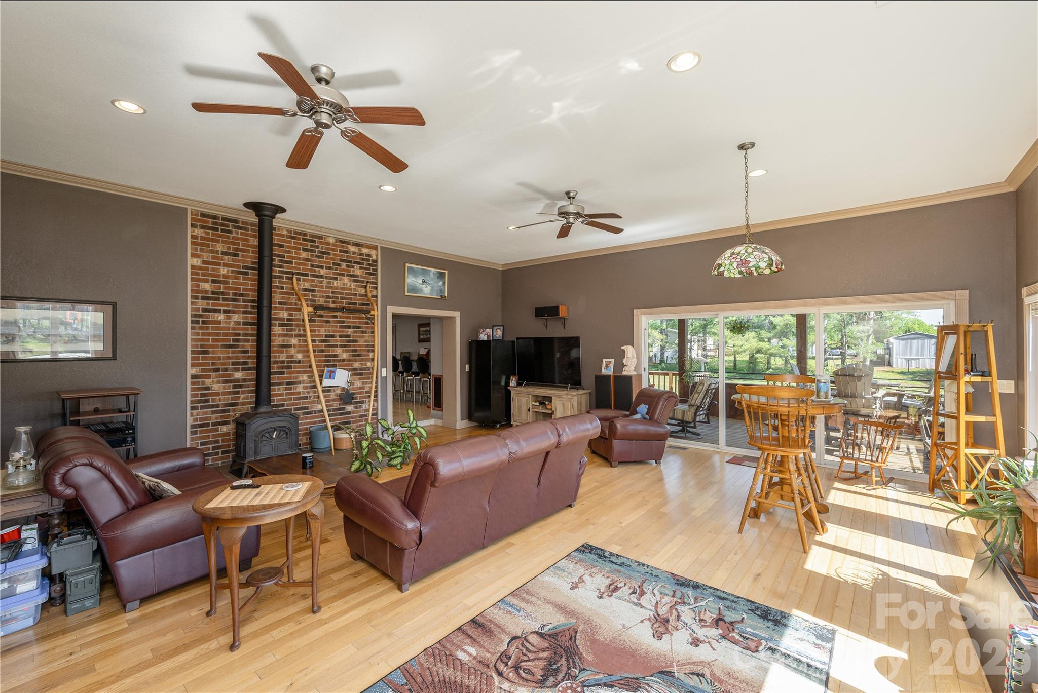 231 Allen Road East Flat Rock, NC 28726 - Photo 12 of 42 a living room with furniture and a large window