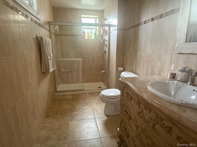4225 Stars Road East Marion, NY 11939 - Photo 12 of 16 a bathroom with a sink a toilet and shower