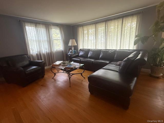 4225 Stars Road East Marion, NY 11939 - Photo 4 of 16 a living room with furniture and a large window