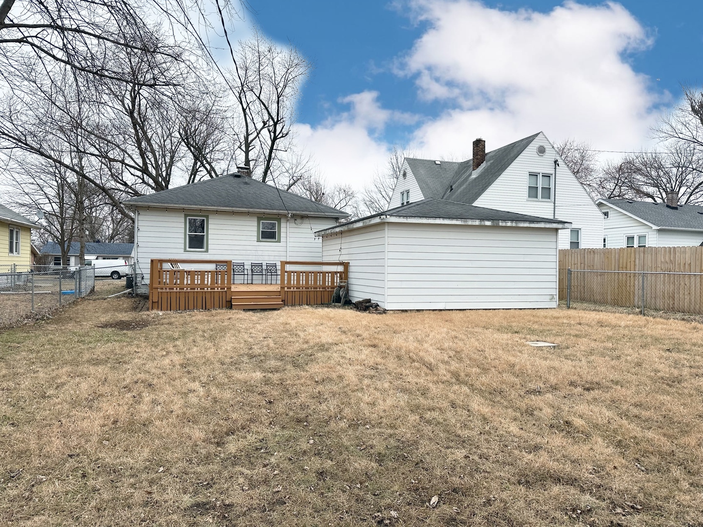 1075 South 7th Avenue Kankakee, IL 60901 - Photo 31 of 32 a front view of a house with a yard and garage