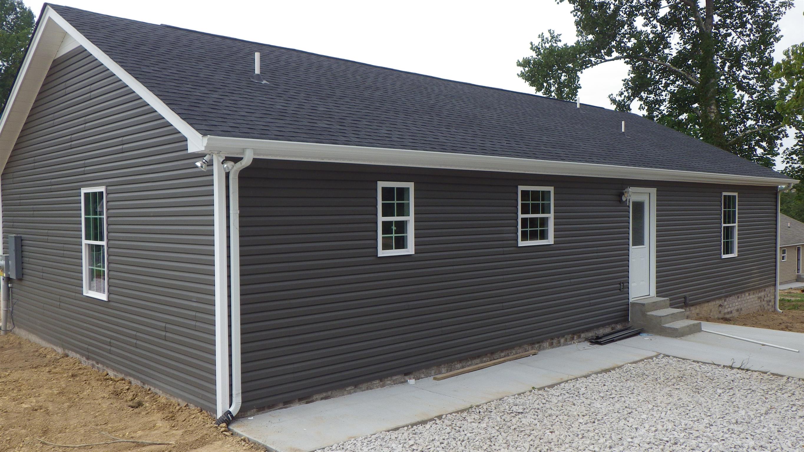 1211 East Ab Wade Road Portland, TN 37148 - Photo 26 of 30 a front view of a house