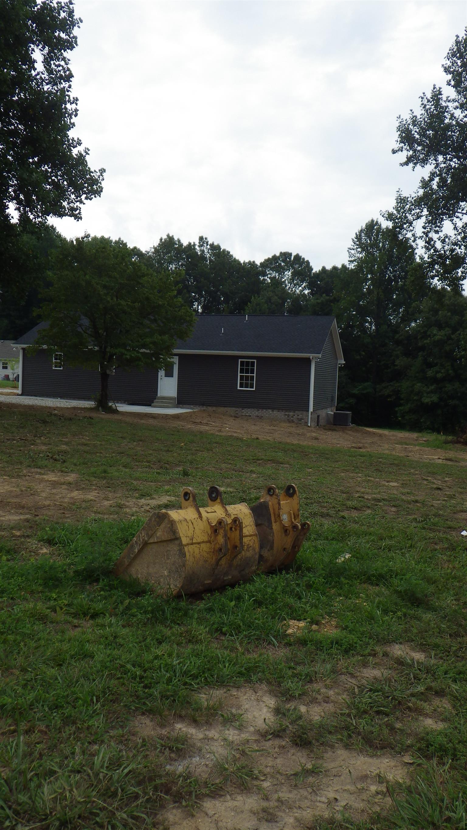 1211 East Ab Wade Road Portland, TN 37148 - Photo 27 of 30 a backyard of a house with lots of green space