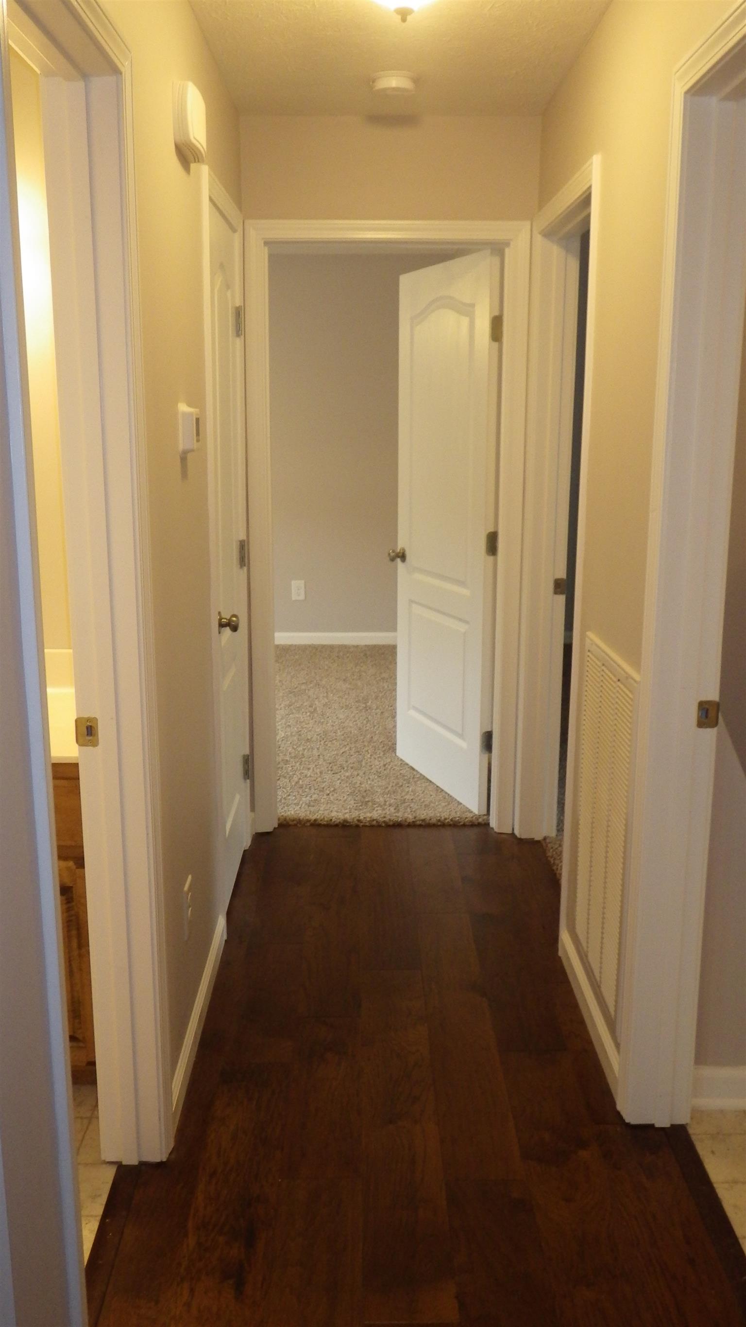 1211 East Ab Wade Road Portland, TN 37148 - Photo 10 of 30 a view of a bathroom with wooden floor
