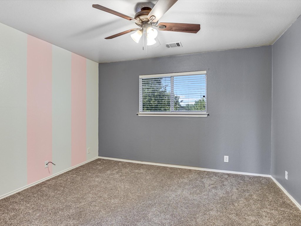 19910 Kennemer Drive Pflugerville, TX 78660 - Photo 15 of 21 a view of an empty room with a window