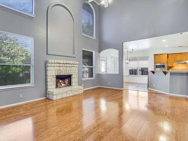 a view of a kitchen with furniture and a fireplace