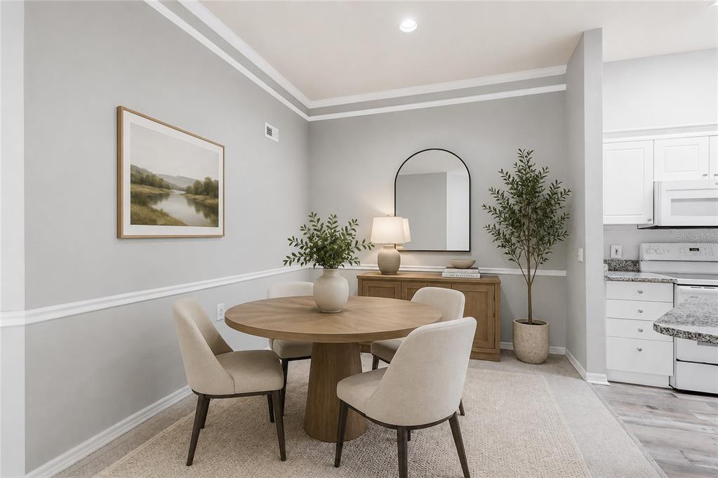 5122 Northridge Road, Unit 307 Sarasota, FL 34238 - Photo 13 of 51 a dining room with furniture and window