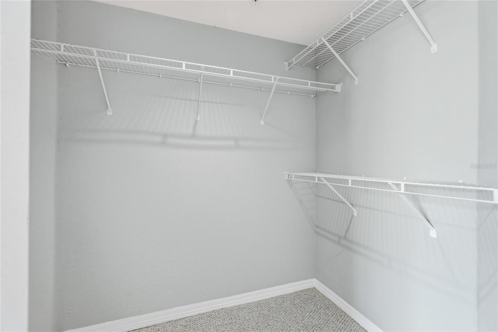 5122 Northridge Road, Unit 307 Sarasota, FL 34238 - Photo 19 of 51 a view of a room with racks on the wall