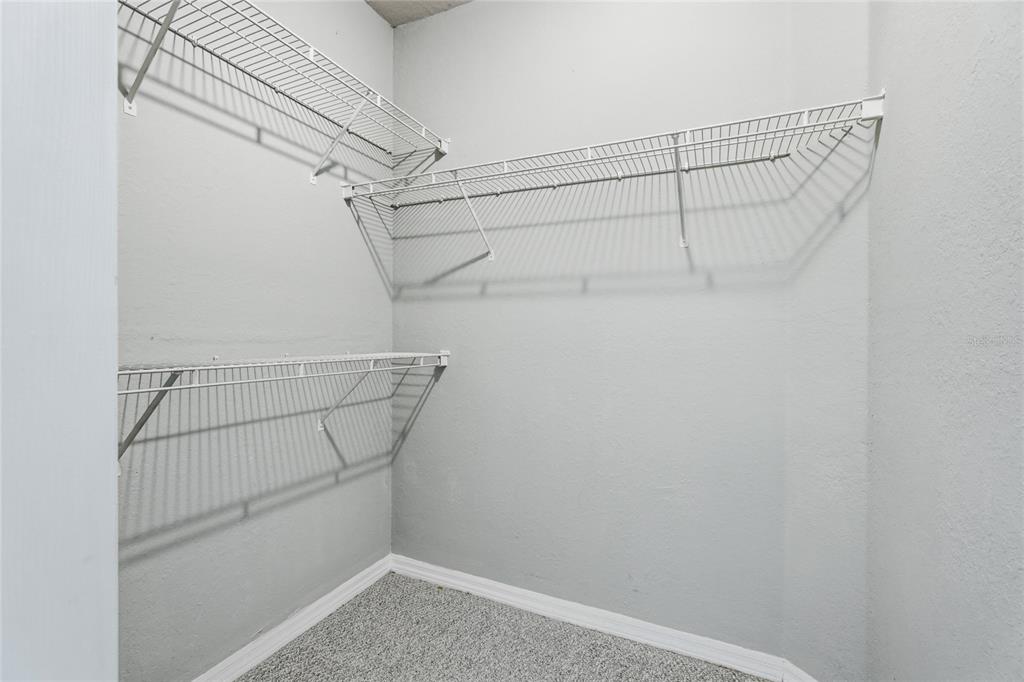5122 Northridge Road, Unit 307 Sarasota, FL 34238 - Photo 23 of 51 a view of a room with racks on the wall