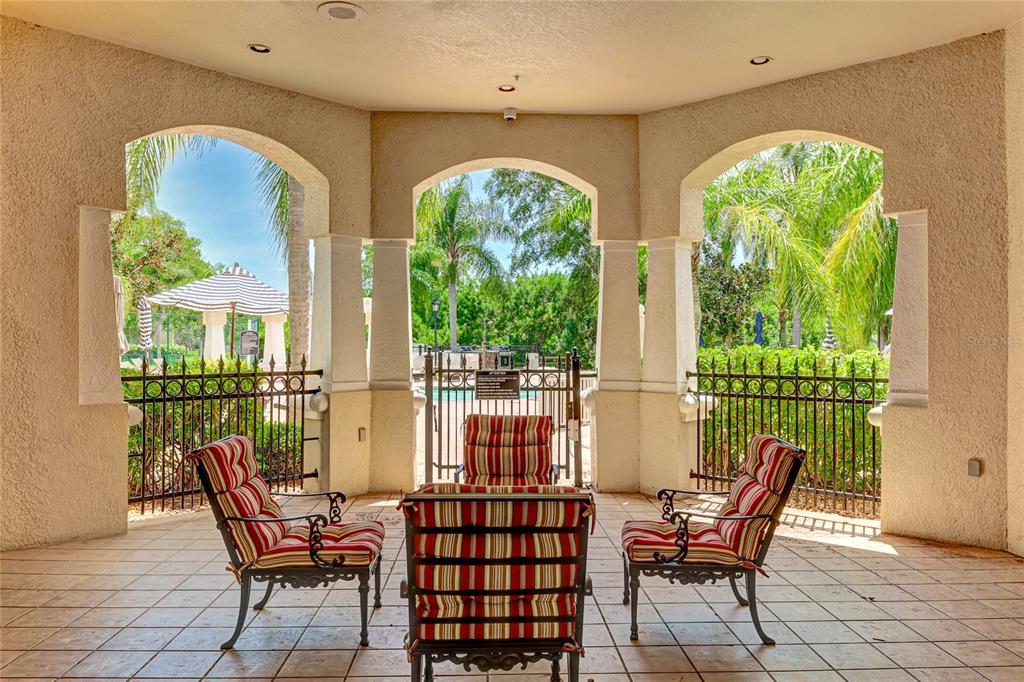 5122 Northridge Road, Unit 307 Sarasota, FL 34238 - Photo 37 of 51 a view of a two room with a table and chairs