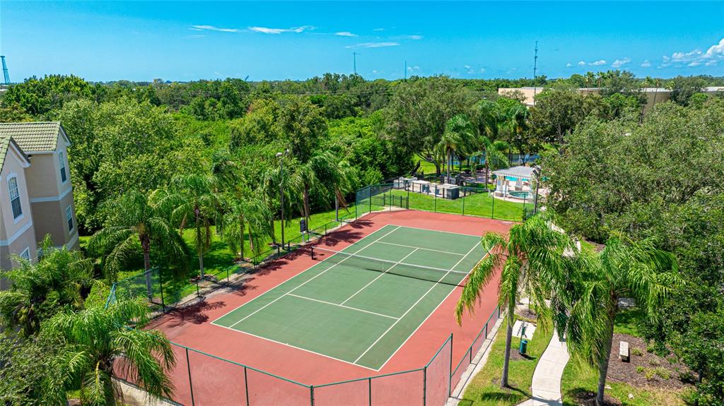 5122 Northridge Road, Unit 307 Sarasota, FL 34238 - Photo 38 of 51 an aerial view of a tennis ground and tennis court