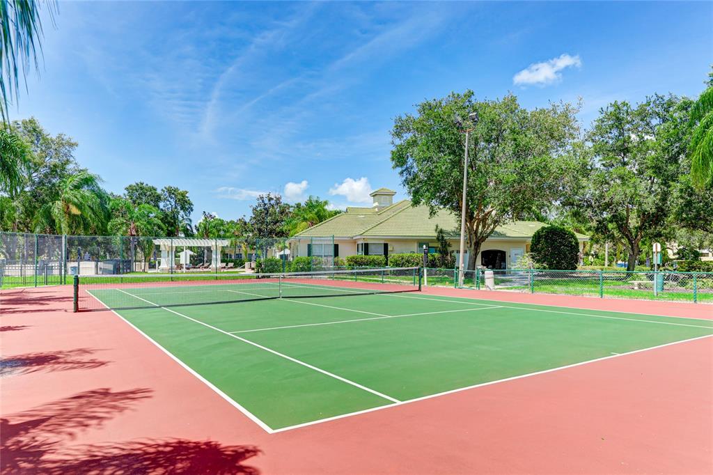 5122 Northridge Road, Unit 307 Sarasota, FL 34238 - Photo 39 of 51 a view of a big yard with palm trees