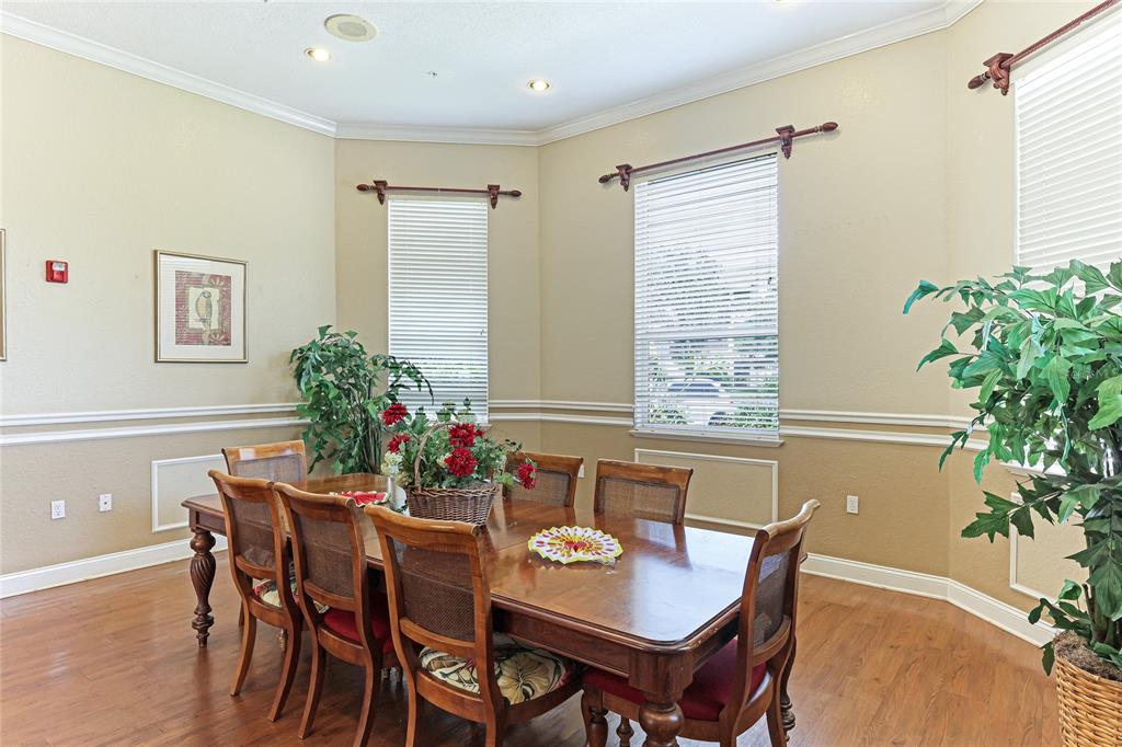 5122 Northridge Road, Unit 307 Sarasota, FL 34238 - Photo 43 of 51 a view of a dining room with furniture and window