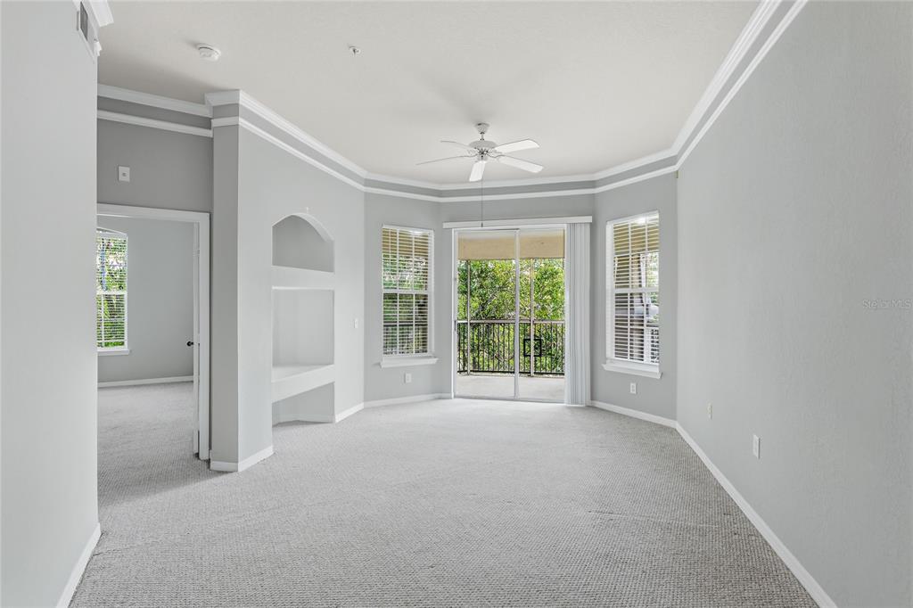5122 Northridge Road, Unit 307 Sarasota, FL 34238 - Photo 5 of 51 a view of an empty room with a window