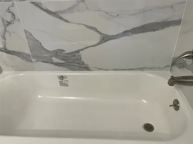 a close up of a bathtub