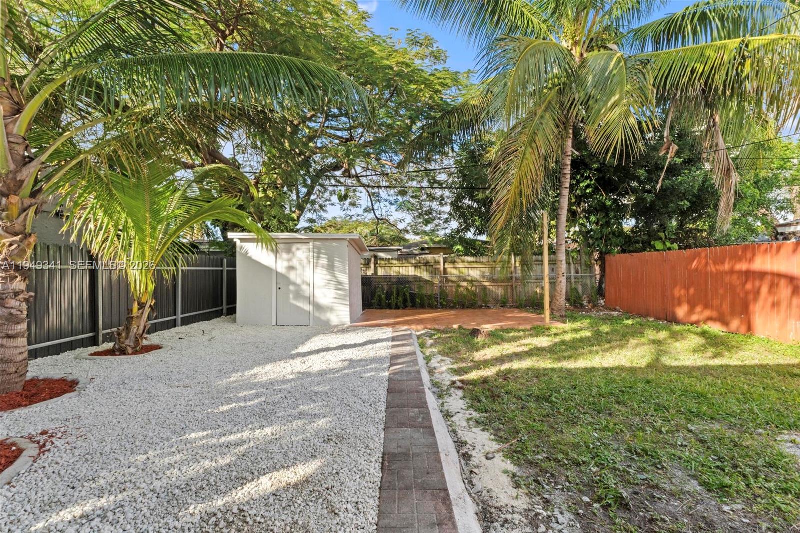 3507 Southwest 25th Terrace Miami, FL 33133 - Photo 18 of 32 a front view of a house with a yard