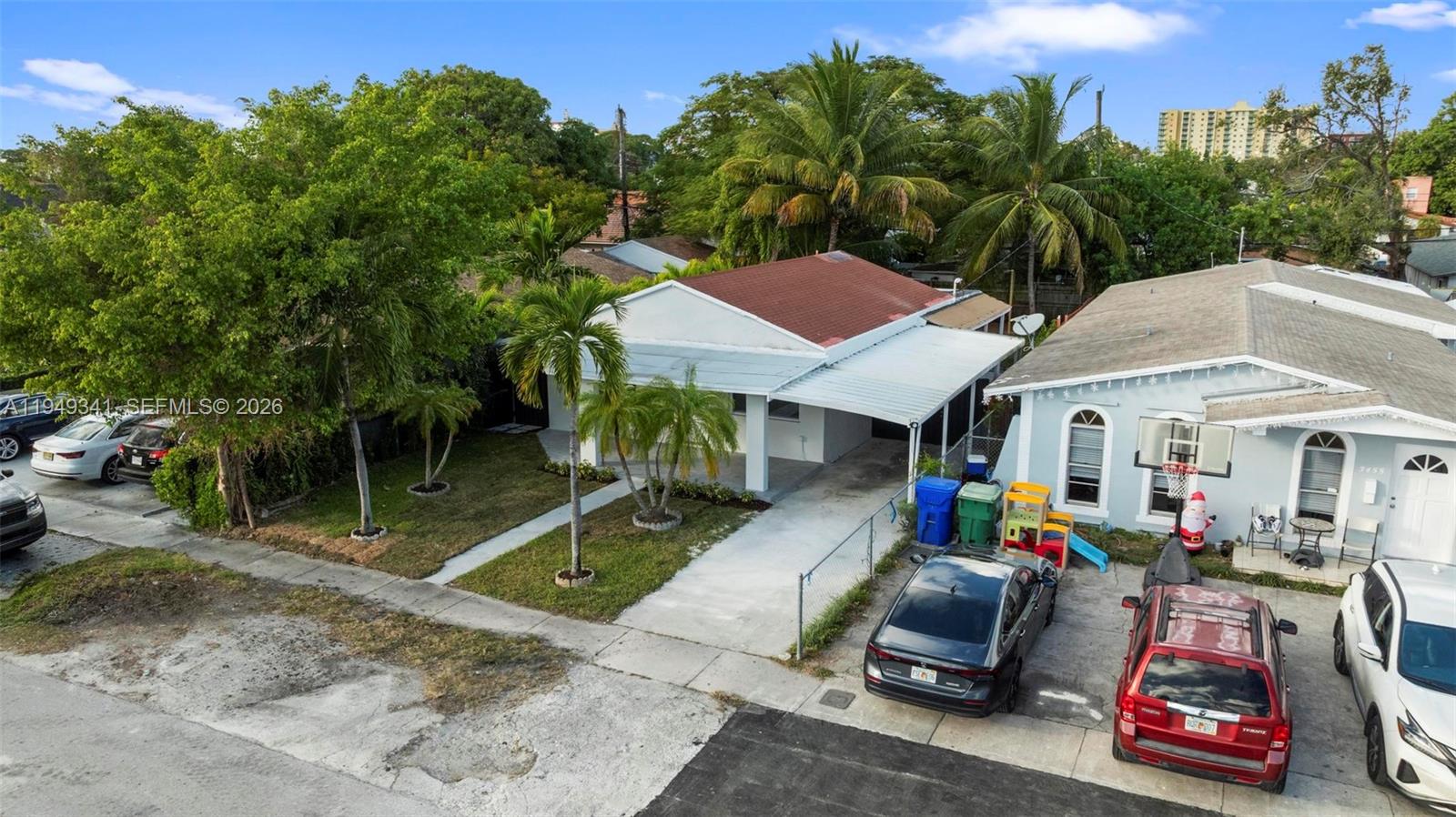 3507 Southwest 25th Terrace Miami, FL 33133 - Photo 30 of 32 a front view of a house with garden