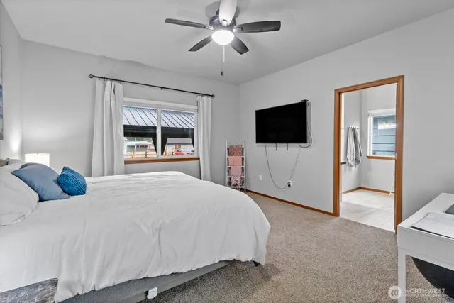 a bathroom with a sink a mirror and a toilet