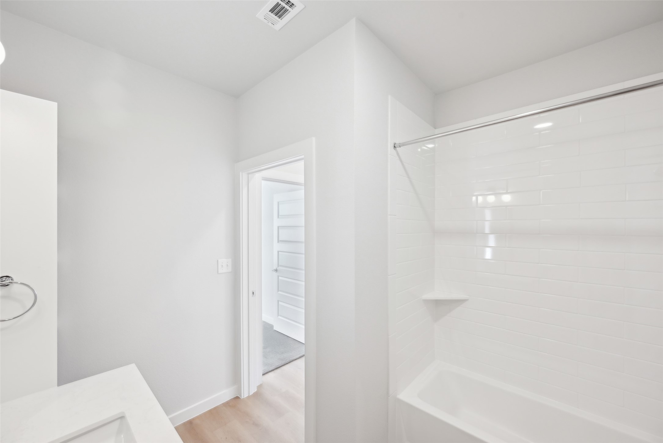 3651-614 South Custer Road McKinney, TX 75070 - Photo 18 of 25 a bathroom with a bathtub and a shower