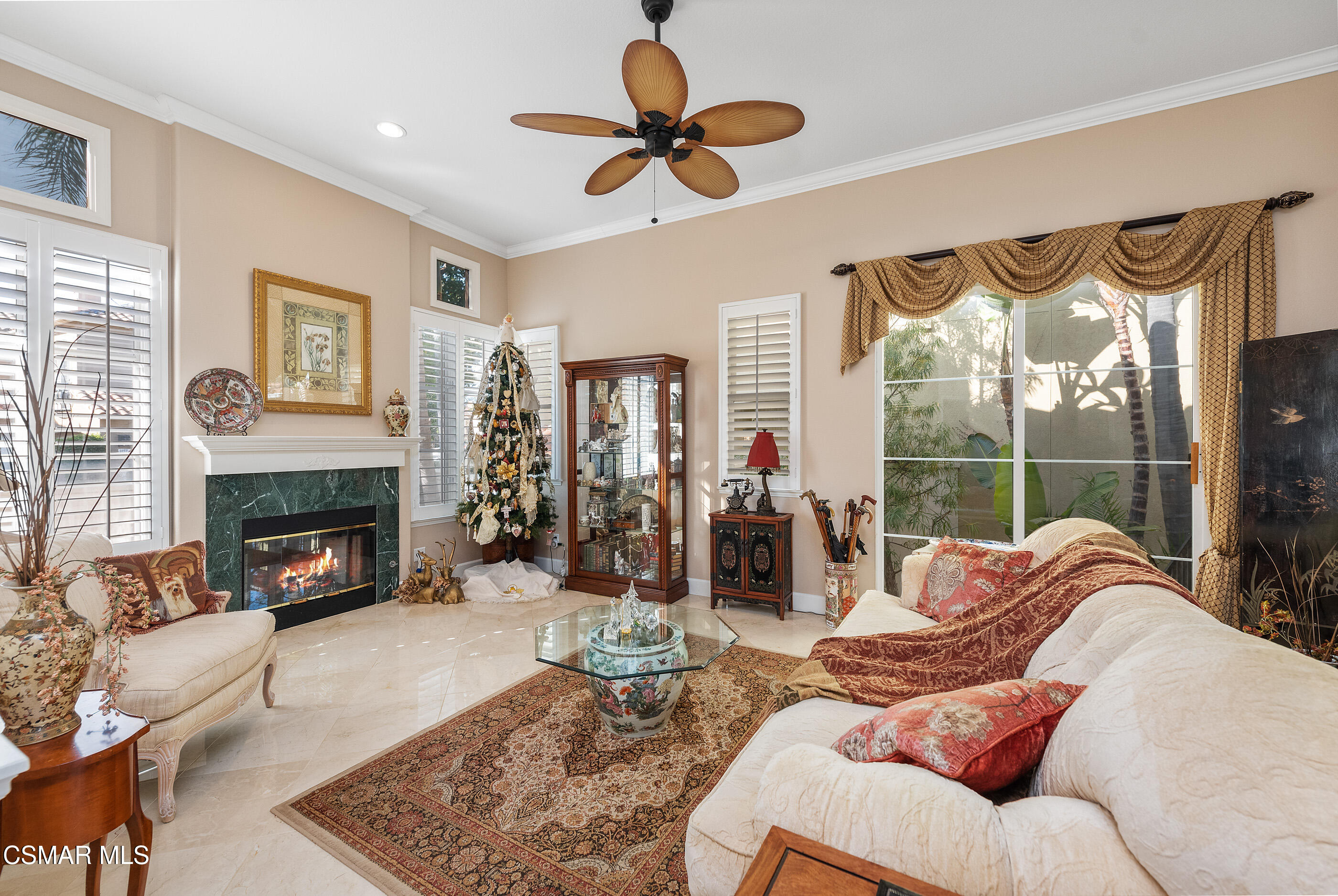 1142 Corte Riviera Camarillo, CA 93010 - Photo 3 of 49 a living room with furniture a fireplace and a large window with outer view