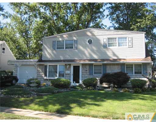 16 Altamont Road Edison, NJ 08817 - Photo 1 of 16 a view of a house with backyard and garden