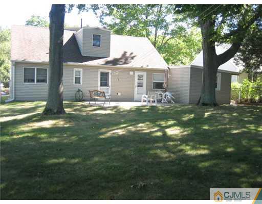 16 Altamont Road Edison, NJ 08817 - Photo 15 of 16 a view of a house with a yard