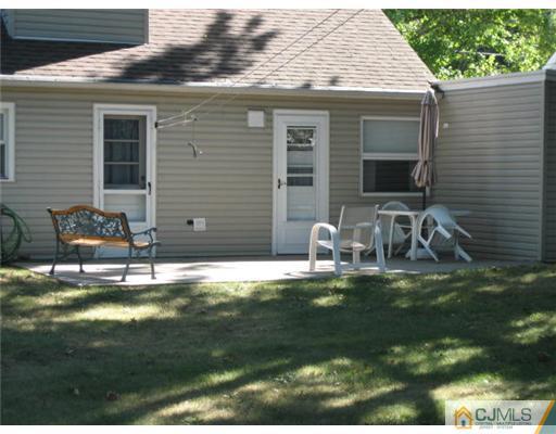 16 Altamont Road Edison, NJ 08817 - Photo 16 of 16 a house view with a sitting space garden view with a outdoor space