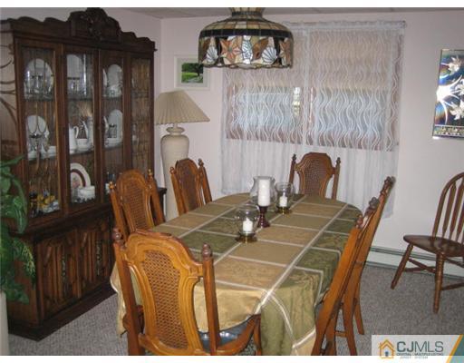 16 Altamont Road Edison, NJ 08817 - Photo 3 of 16 a dining room with furniture and window