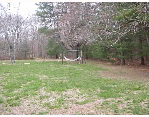 300 Table Rock Road South Kingstown, RI 02879 - Photo 5 of 8 Yard/Garden. large backyard bordered by open space