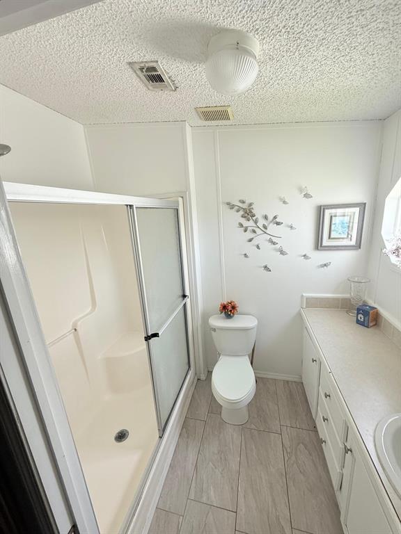 2090 Southwest 85th Avenue Davie, FL 33324 - Photo 12 of 37 a bathroom with a sink toilet and shower
