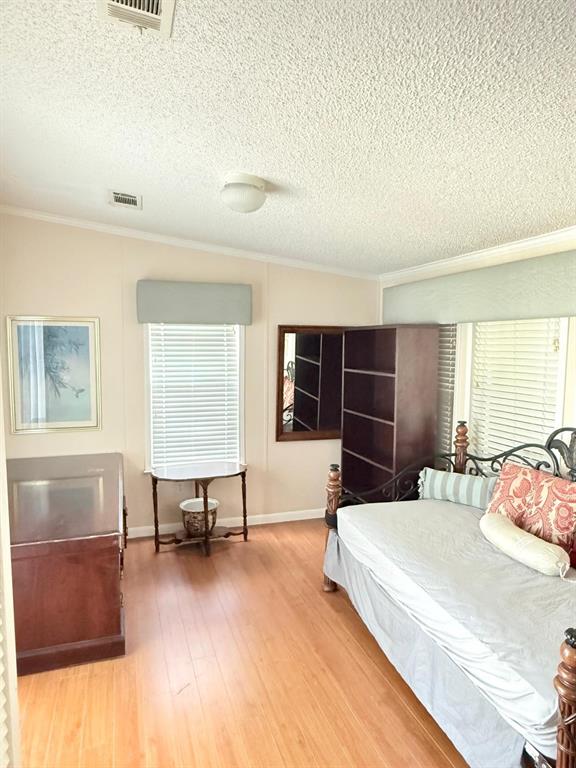 2090 Southwest 85th Avenue Davie, FL 33324 - Photo 15 of 37 a bedroom with a bed and window