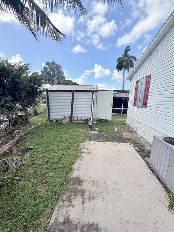 2090 Southwest 85th Avenue Davie, FL 33324 - Photo 19 of 37 a view of a house with a yard